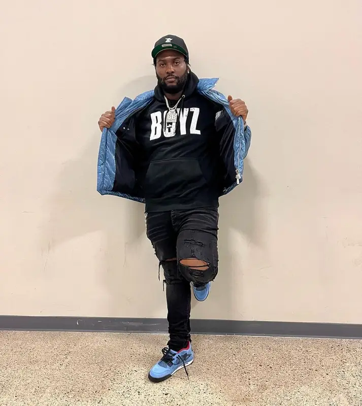 Peezy outfit in Dior, Fear of God, and New Era, 2022