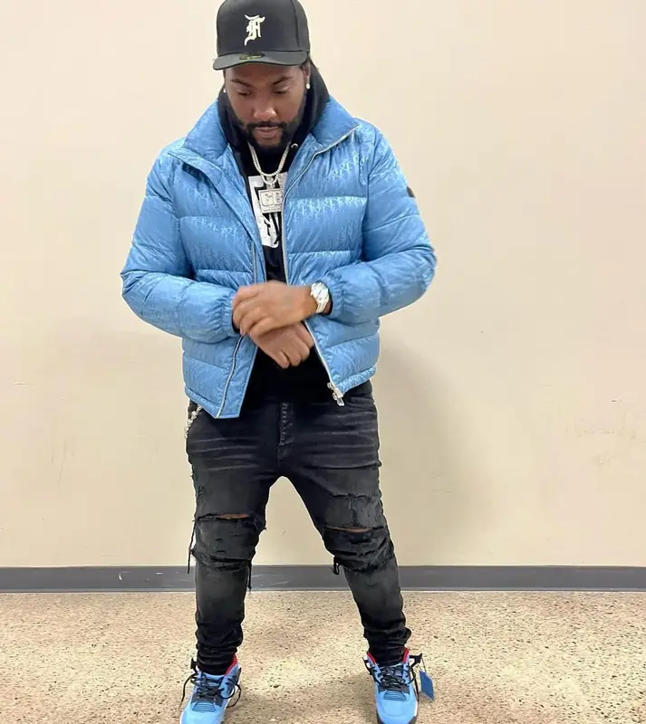 Peezy outfit in Dior, Fear of God, and New Era, 2022