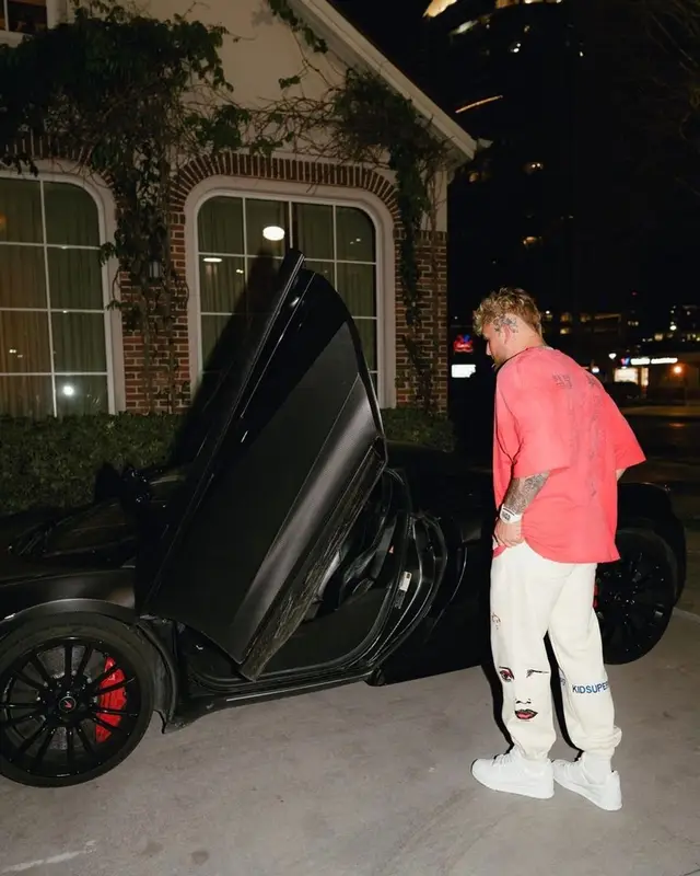 Jake Paul outfit in Maison Mihara Yasuhiro, KidSuper, and Louis Vuitton, 2022