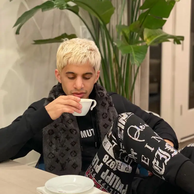 Zahir outfit in Helmut Lang, Philipp Plein, and Louis Vuitton, 2021