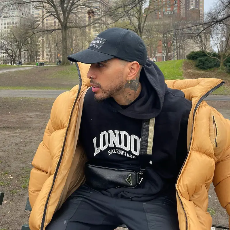 Rauw Alejandro outfit in Balenciaga, Prada, and Raf Simons, 2022