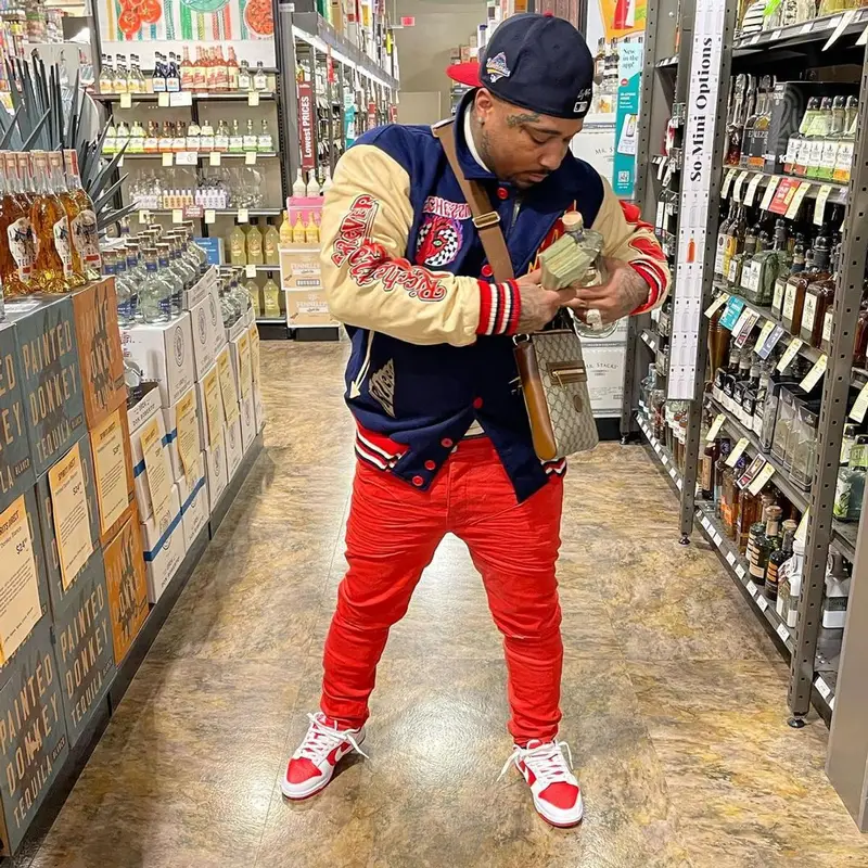 Doe Boy outfit in Ricchezza Forever, Purple Brand, and Gucci, 2022