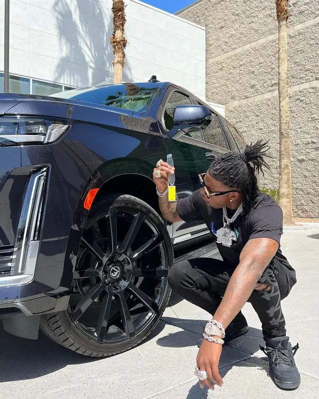 CJ So Cool outfit in Dior, Amiri, and Louis Vuitton, 2022