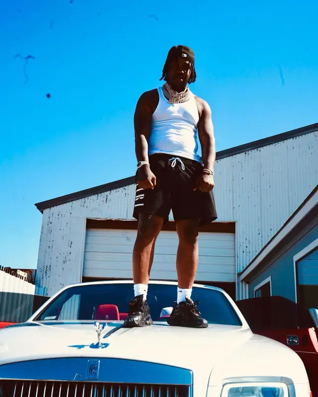 EST Gee outfit in Balenciaga, Amiri, and Nike, 2022
