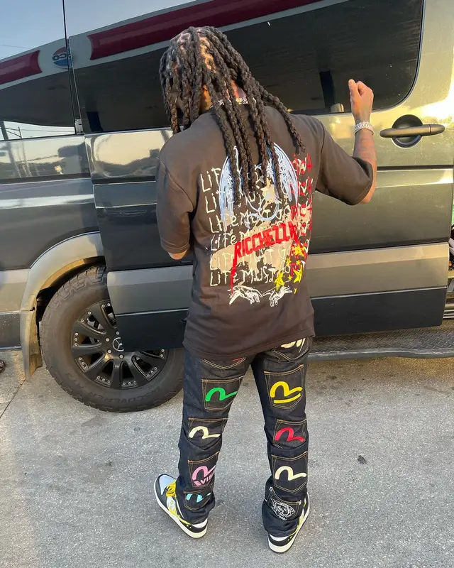 Jacquees outfit in Ricchezza Forever, Evisu, and Cartier, 2022