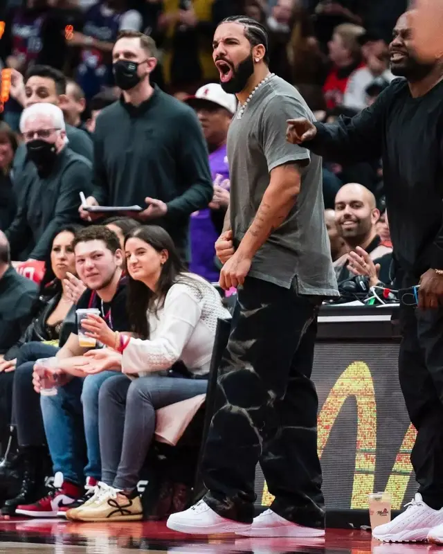 Drake outfit in Marni, Dries Van Noten, and Nike, 2022