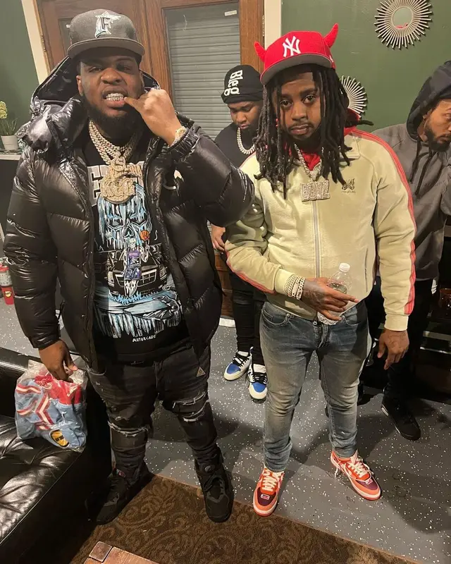 Maxo Kream outfit in Moncler, Warren Lotas, and New Era, 2022