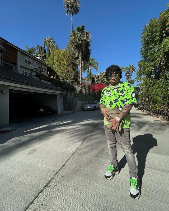 No Cap outfit in Dior, Louis Vuitton, and Balenciaga, 2022