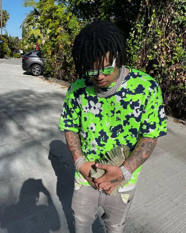 No Cap outfit in Dior, Louis Vuitton, and Balenciaga, 2022