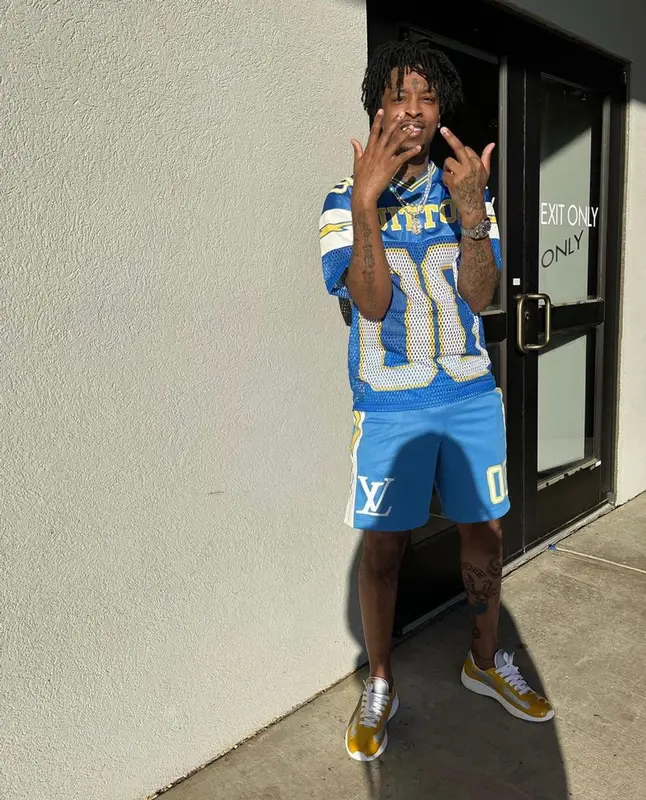 21 Savage outfit in Louis Vuitton and Prada, 2022