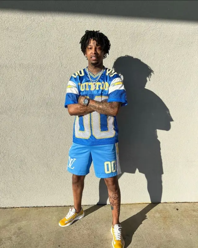 21 Savage outfit in Louis Vuitton and Prada, 2022