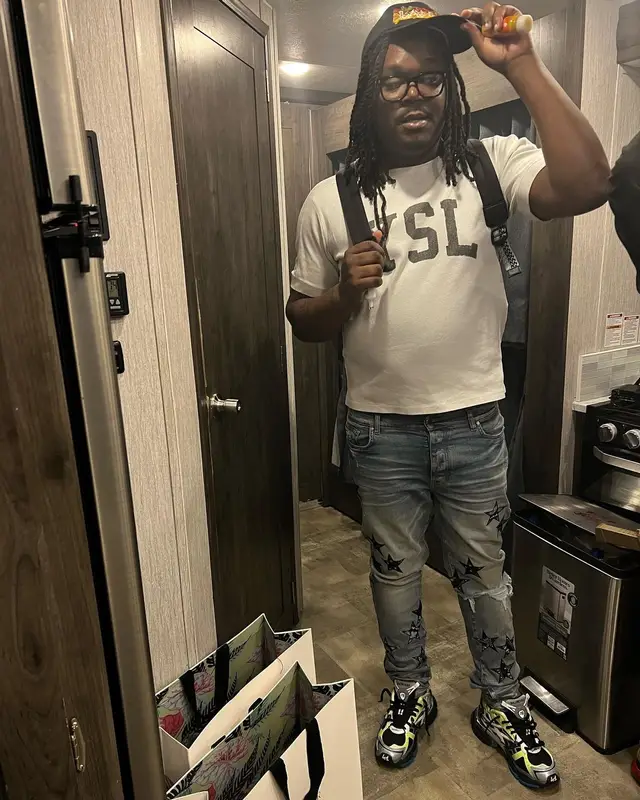 Lucki outfit in Saint Laurent, Amiri, and Lanvin, 2022