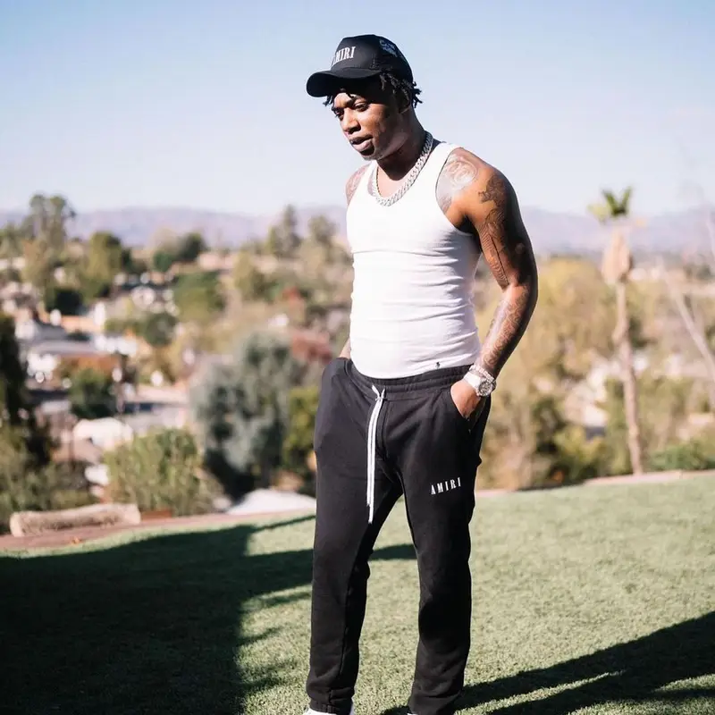 Fredo Bang outfit in Polo Ralph Lauren, Nike, and Amiri, 2021