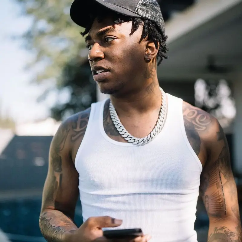 Fredo Bang outfit in Polo Ralph Lauren, Nike, and Amiri, 2021