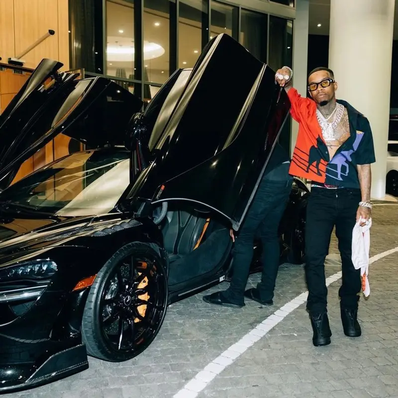 Tory Lanez outfit in Prada, Amiri, and Rhude, 2022
