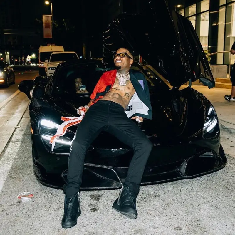 Tory Lanez outfit in Prada, Amiri, and Rhude, 2022