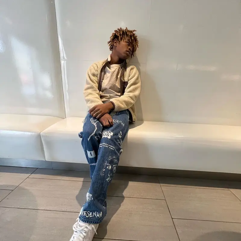 Tokin outfit in Patagonia, KidSuper, and Nike, 2022