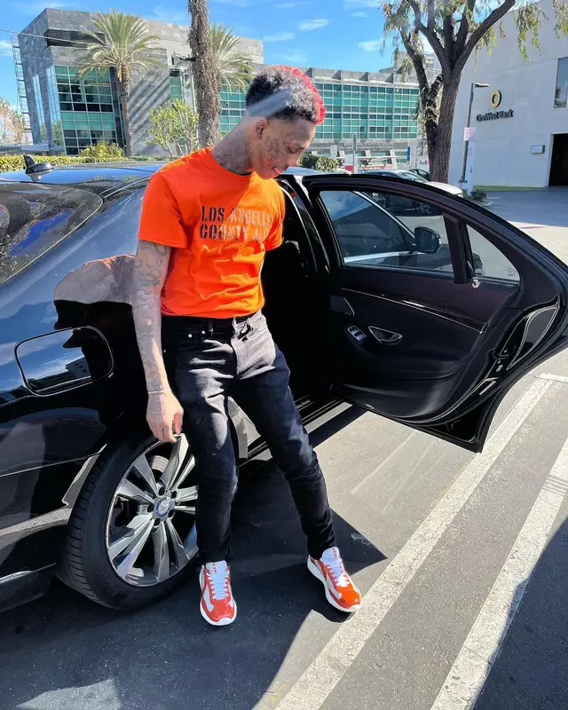 Famous Dex outfit in Vintage, Ksubi, and Prada, 2022