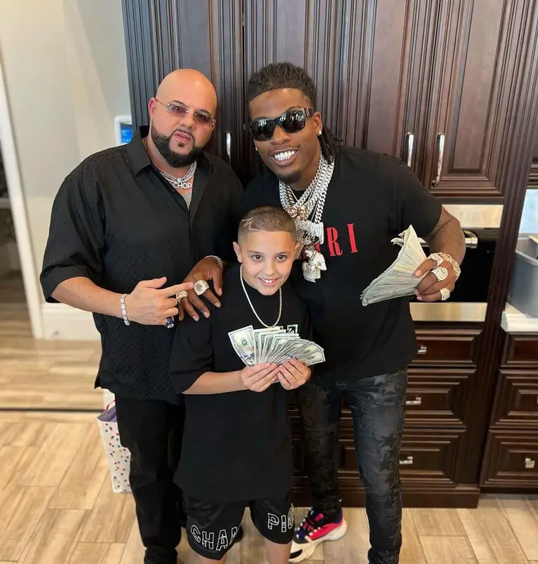 CJ So Cool outfit in Amiri, Chemist, and Versace, 2022