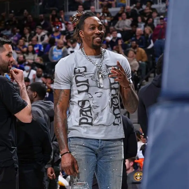 Dwight Howard outfit in Canada Goose, Purple Brand, and Apple, 2022