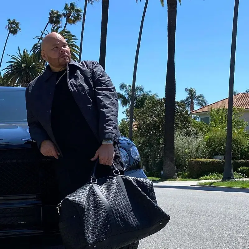 Fat Joe outfit in Louis Vuitton, Nike, and Bottega Veneta, 2022