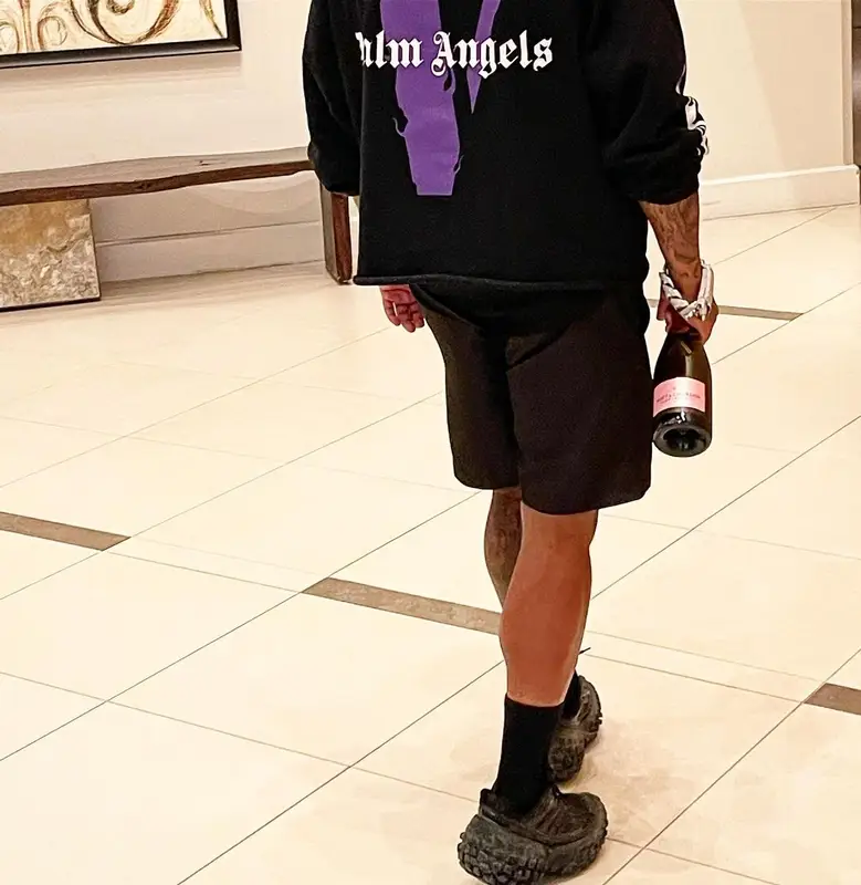 Westside Gunn outfit in Vlone, New Era, and Palm Angels, 2022