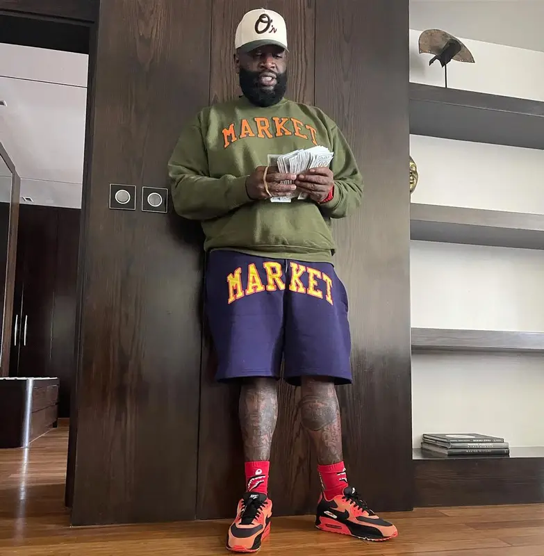 Rick Ross outfit in Market, Nike, and Bape, 2022