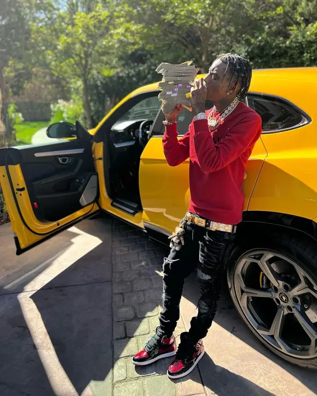 Soulja Boy outfit in Balmain, Amiri, and Versace, 2022