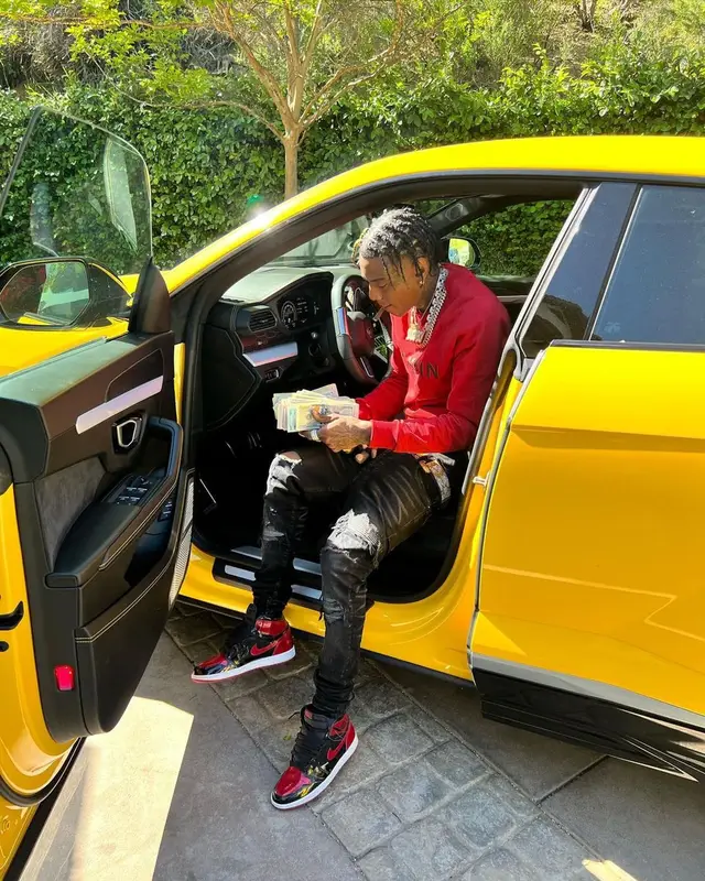 Soulja Boy outfit in Balmain, Amiri, and Versace, 2022
