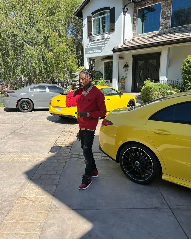 Soulja Boy outfit in Balmain, Amiri, and Versace, 2022