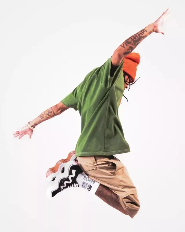 Tyga outfit in Menace, Dickies, and R13, 2022