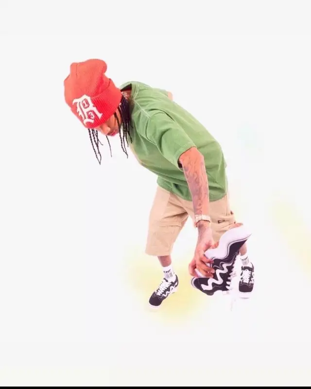 Tyga outfit in Menace, Dickies, and R13, 2022