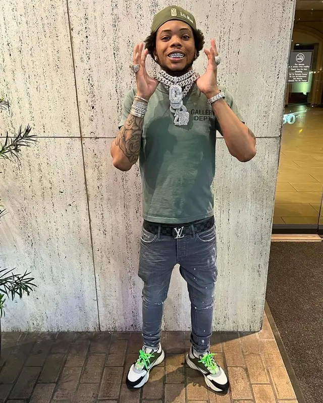 Lil Migo outfit in Gallery Dept., Louis Vuitton, and New Era, 2022