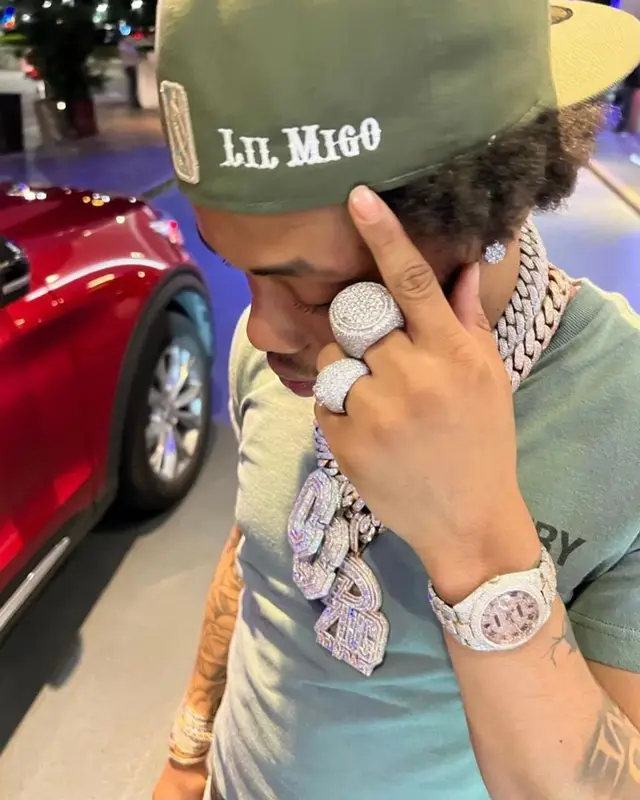 Lil Migo outfit in Gallery Dept., Louis Vuitton, and New Era, 2022