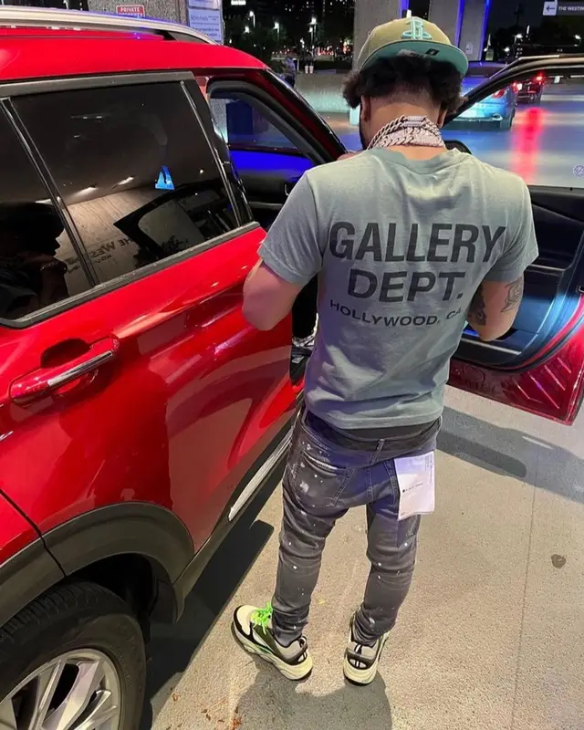 Lil Migo outfit in Gallery Dept., Louis Vuitton, and New Era, 2022