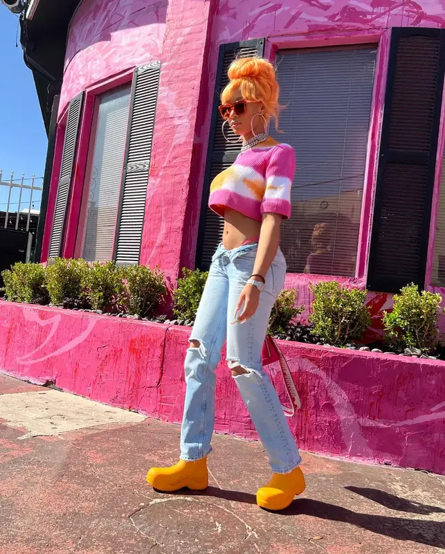 Lakeyah outfit in MSGM, Louis Vuitton, and Bottega Veneta, 2022