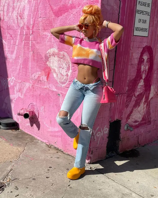 Lakeyah outfit in MSGM, Louis Vuitton, and Bottega Veneta, 2022