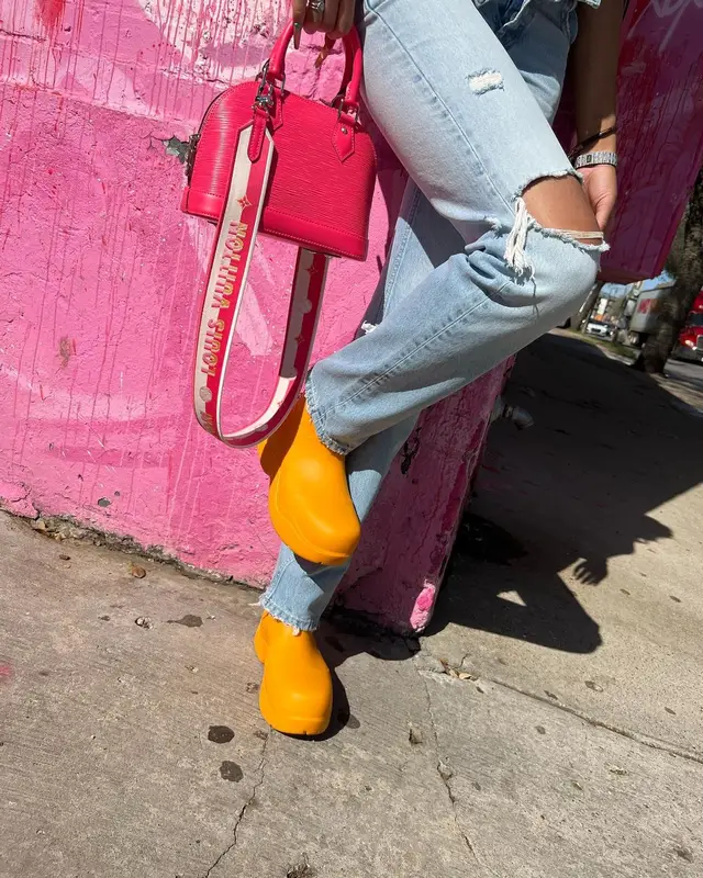Lakeyah outfit in MSGM, Louis Vuitton, and Bottega Veneta, 2022