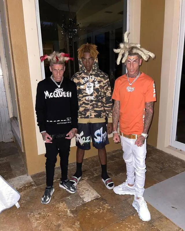 Kodiyakredd outfit in Balmain, Versace, and MCM, 2022