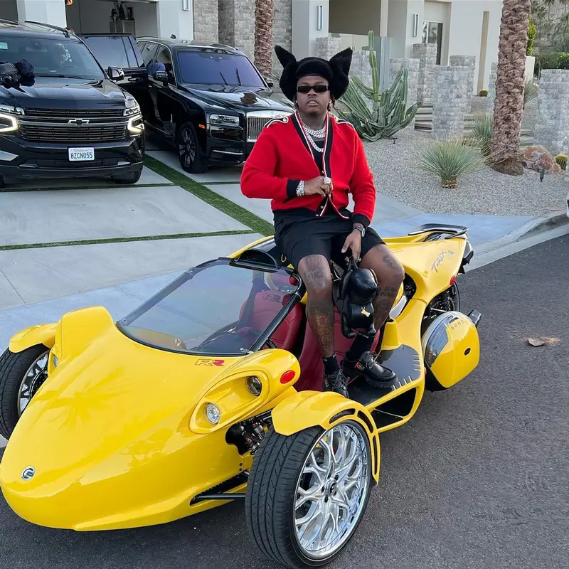Gunna outfit in Celine, Thom Browne, and Dior, 2022