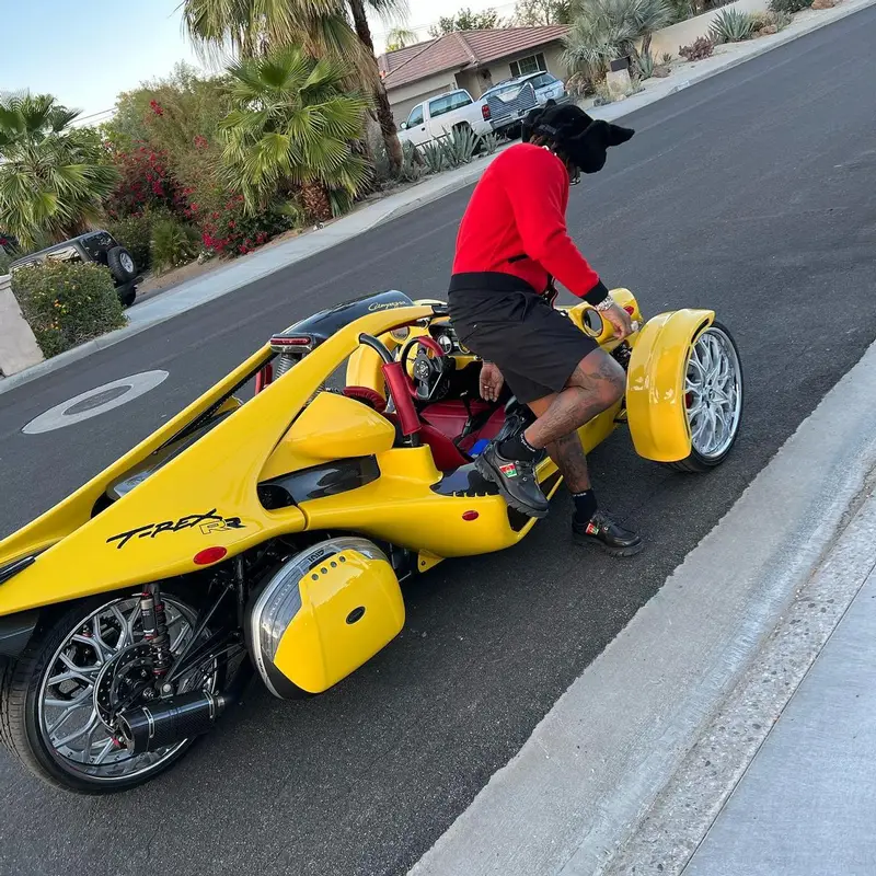 Gunna outfit in Celine, Thom Browne, and Dior, 2022