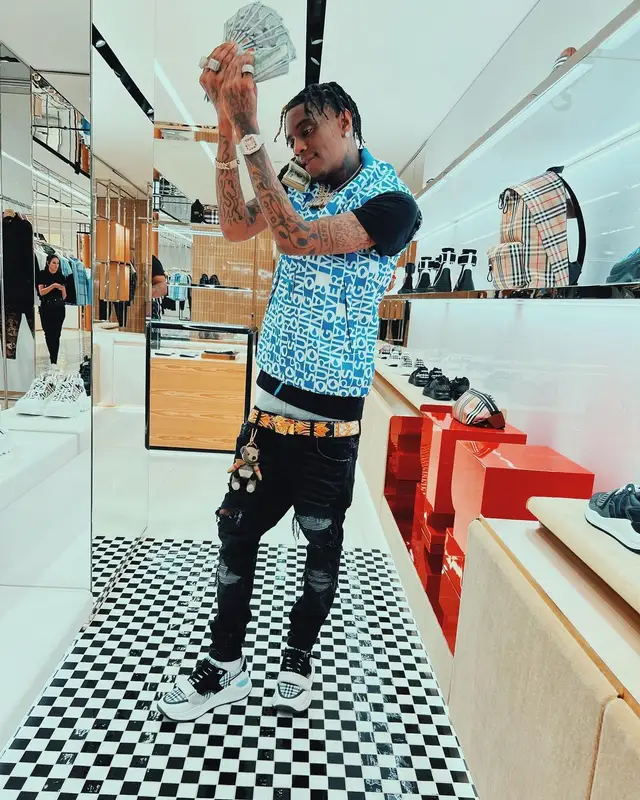 Soulja Boy outfit in Burberry, Amiri, and Versace, 2022
