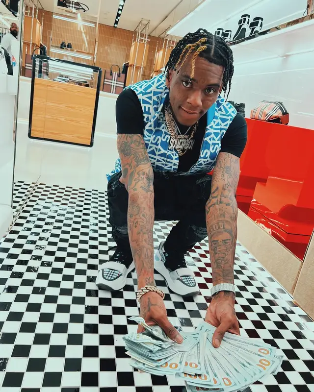 Soulja Boy outfit in Burberry, Amiri, and Versace, 2022