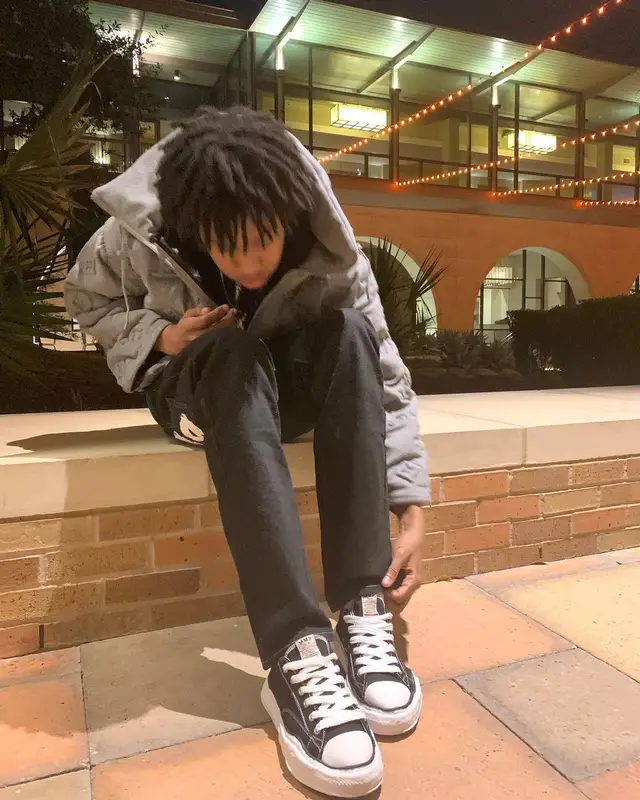 Rich Amiri outfit in Louis Vuitton, Clout Collection, and Maison Mihara Yasuhiro, 2022