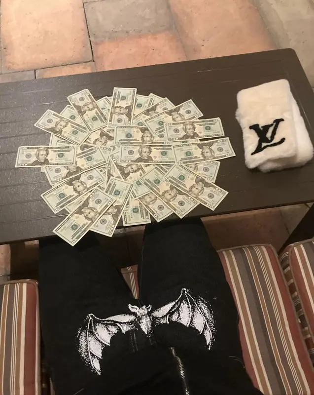 Rich Amiri outfit in Louis Vuitton, Clout Collection, and Maison Mihara Yasuhiro, 2022