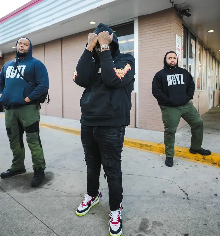 Peezy outfit in Marino Infantry, Amiri, and Nike, 2022