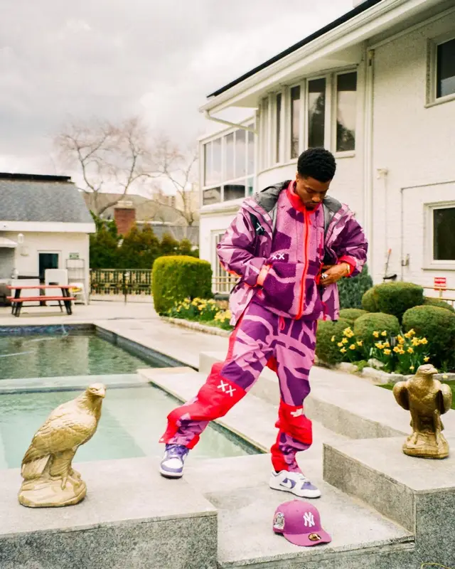 Pierre Bourne outfit in The North Face, Nike, and   Kaws, 2022