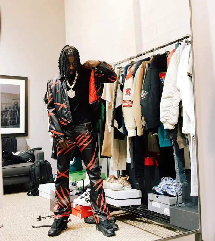 Polo G outfit in Formy Studio and Raf Simons, 2022