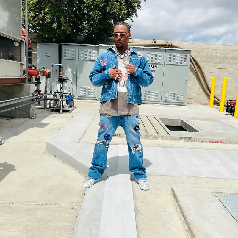 HitBoy outfit in Needles, Denim Tears, and Nike, 2022