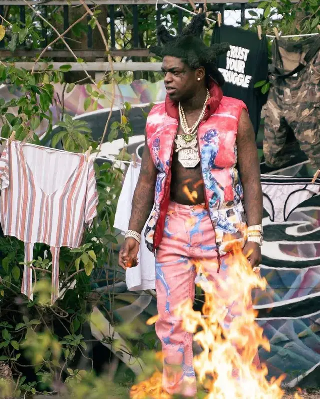 Kodak Black outfit in KidSuper, Versace, and Gucci, 2022